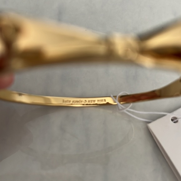 Kate Spade Gold Bracelet with a bow - Picture 3 of 6